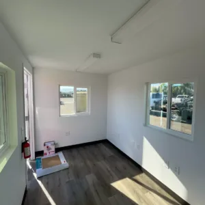 finished office container interior with lighting and windows