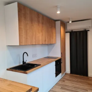 Fitted galley kitchen in a converted 40ft shipping container