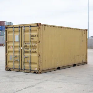 Tan used 20ft shipping container front and side view