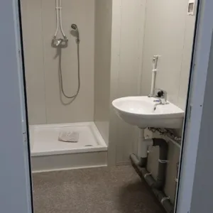 sanitary container sink and plumbing installation